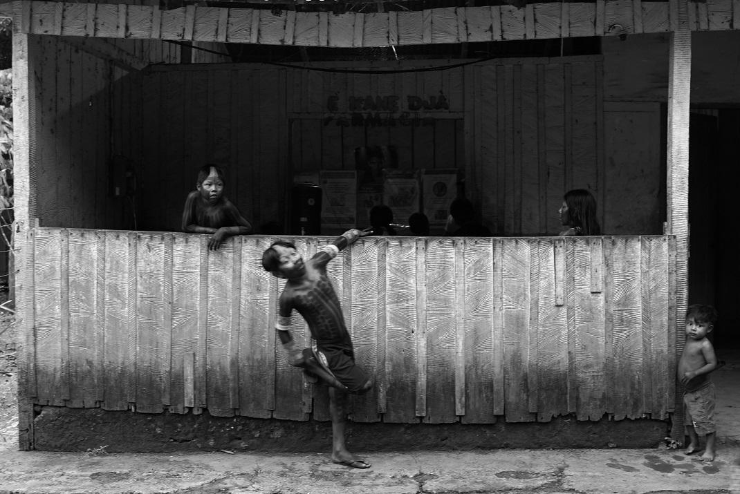 Kayapo children playing, Amazon forest Brazil